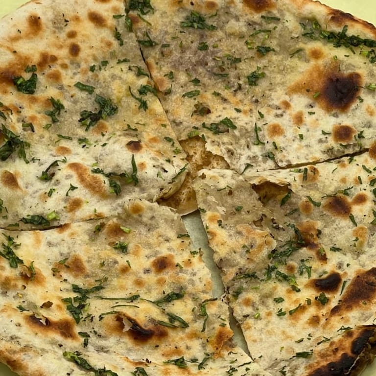 Delicious Naan Bread and Indian Cuisine Favorites